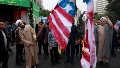 Iranians Burn American Flag.jpg